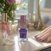 MAGIK purple nail polish bottle, transparent square body, pink metal cap with bow, 15ml details Picture